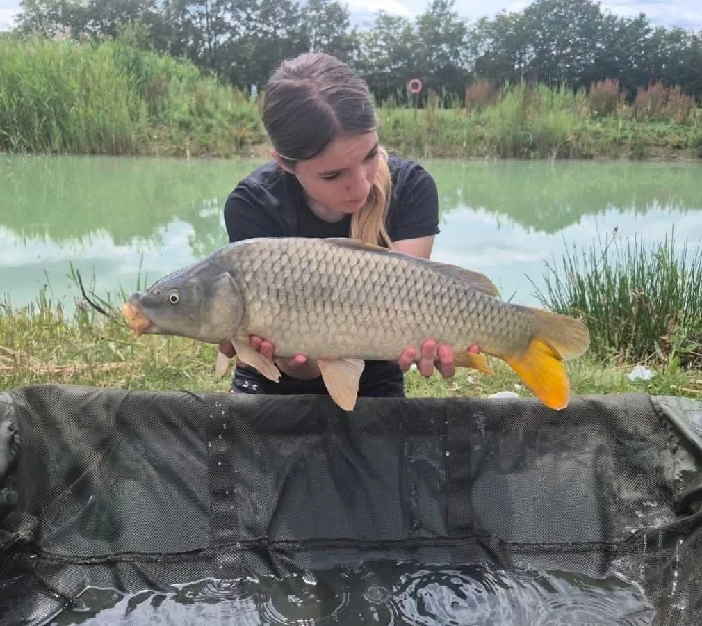 Girl holding fish