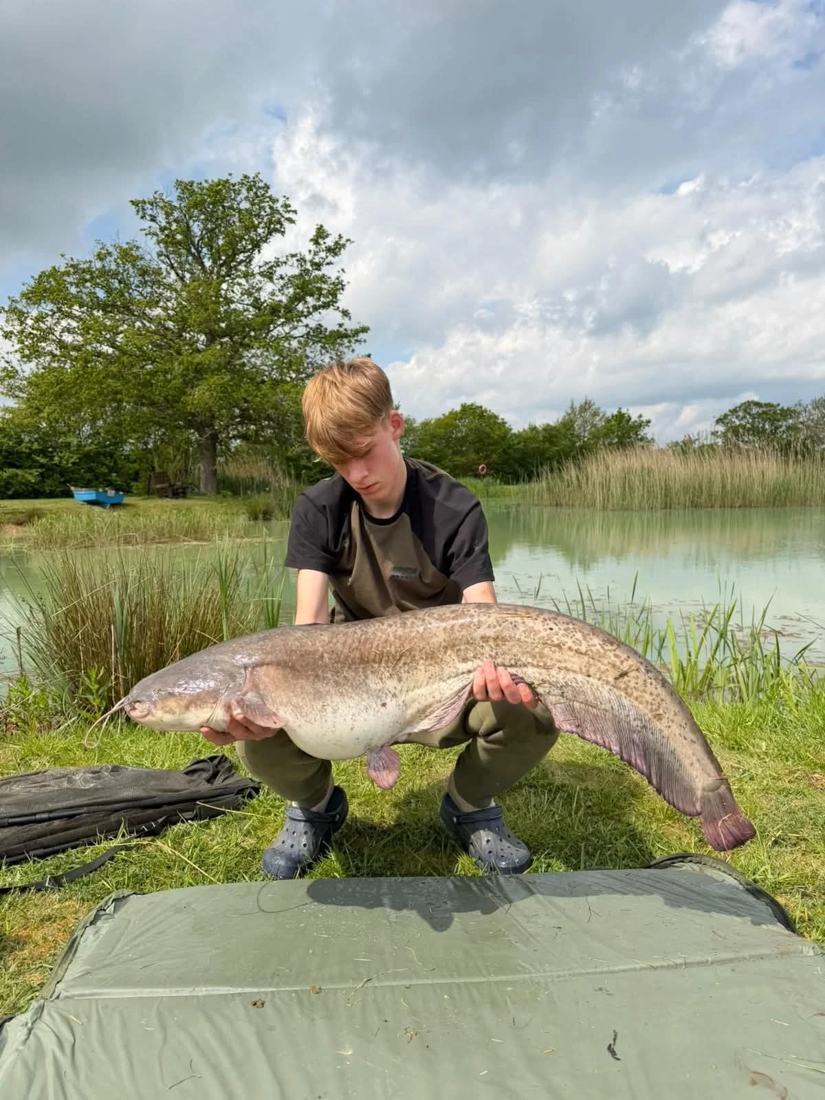 Boy holding fish