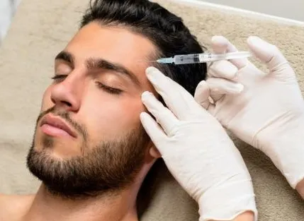 A man getting an injection from a doctor.