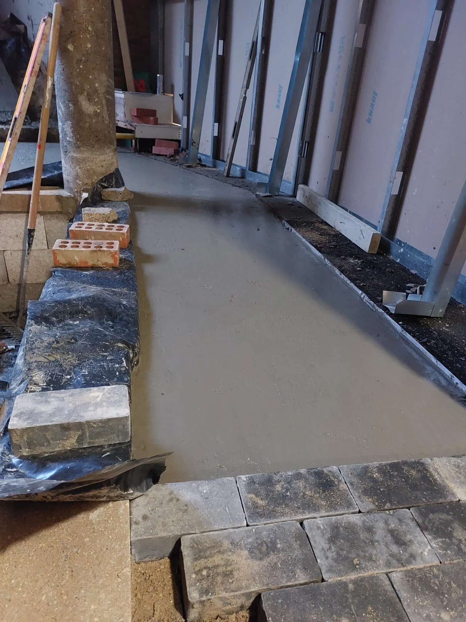 A room that has some kind of cement in it.