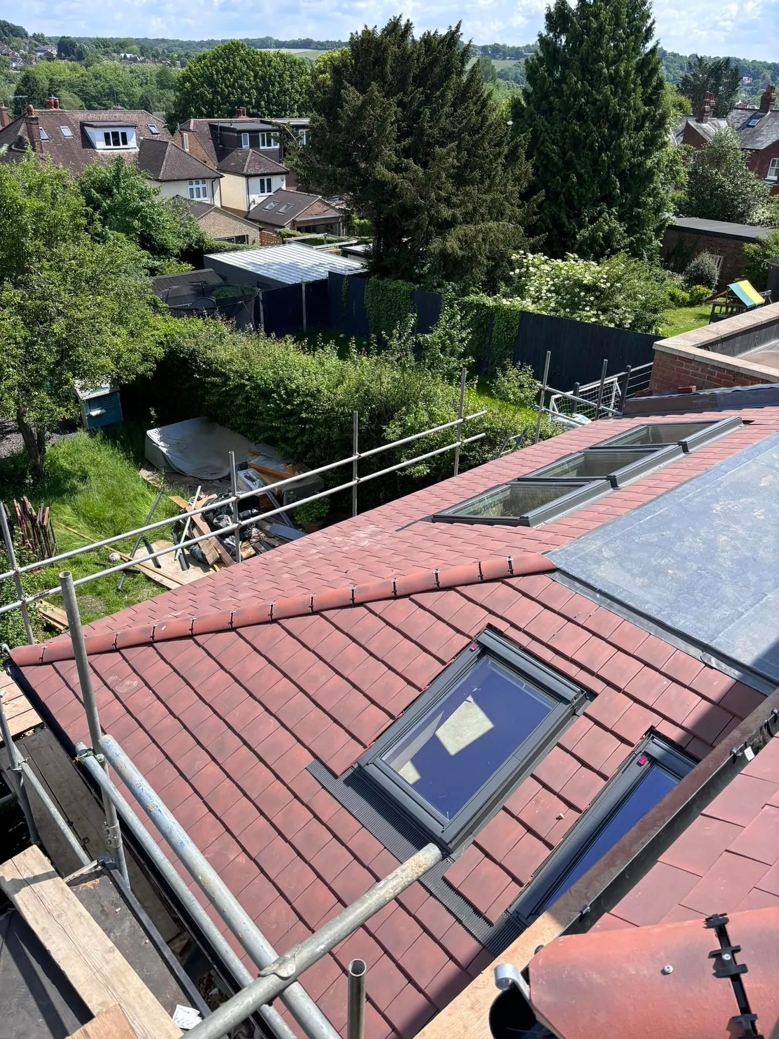 a view of a roof with a skylight on top of it